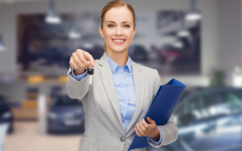 Car Leasing - woman holding a car key